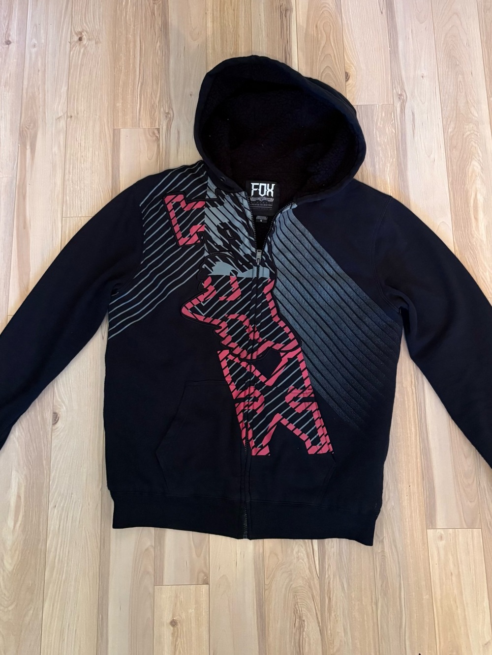 Fox Men’s Black Zip-Up Hoodie with Red Graphic
